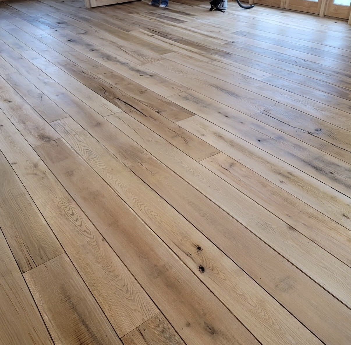 Close detail of hardwood plank grain on a diagonal